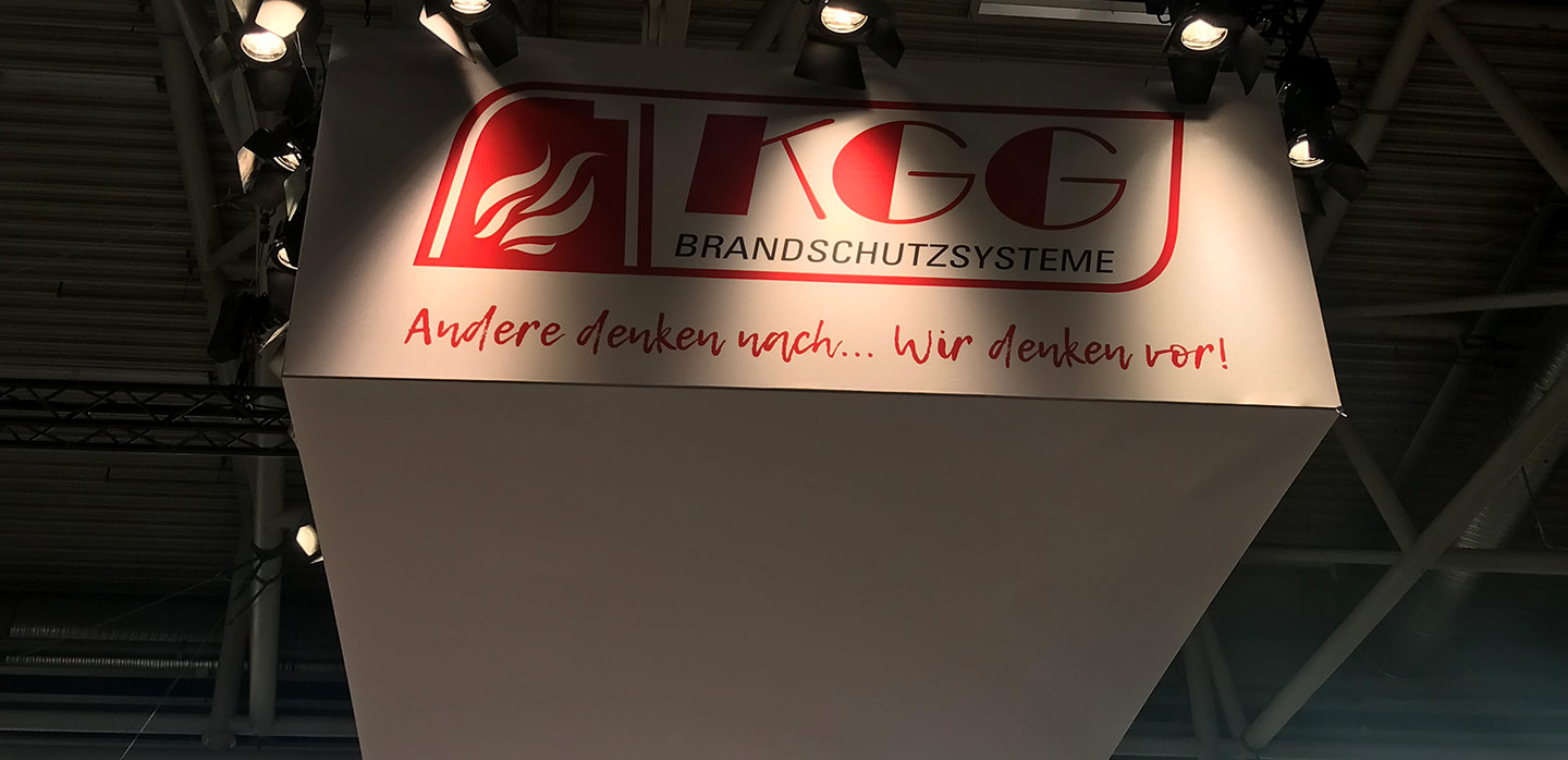 KGG Brandschutzsysteme trade fair stand with the slogan Others reflect, we think ahead
